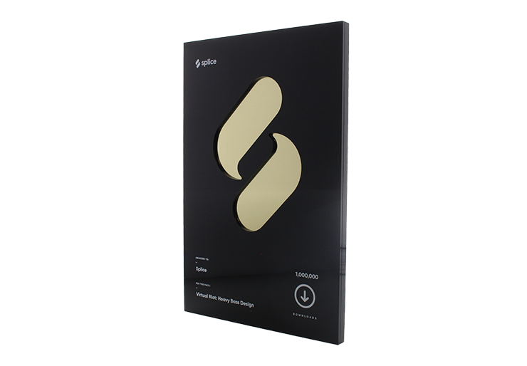 Black plaque featuring a gold logo